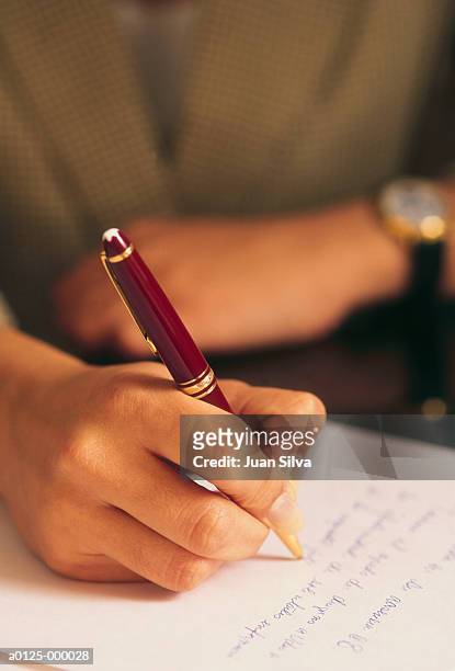 woman writing - korrespondenz stock-fotos und bilder