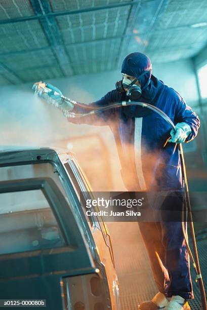 painter in car factory - venezuela stock pictures, royalty-free photos & images