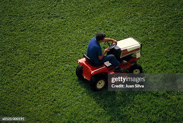 man mowing grass - lawnmower stock-fotos und bilder