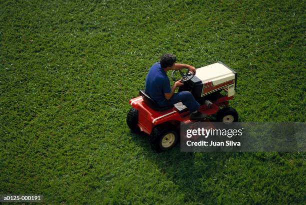 233 Man Riding Lawn Mower Stock Photos, High-Res Pictures, and Images ...