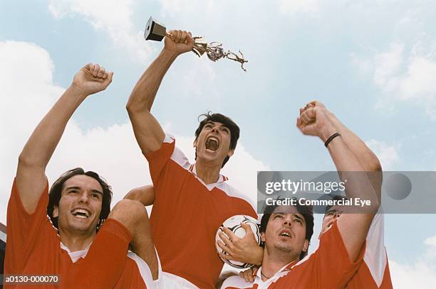soccer team celebrating - championships day four stock pictures, royalty-free photos & images