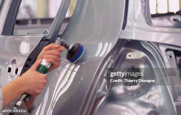 person on production line - cleaning inside of car stock pictures, royalty-free photos & images