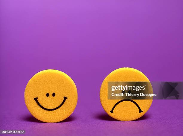 happy face and sad face - anthropomorphic stock pictures, royalty-free photos & images
