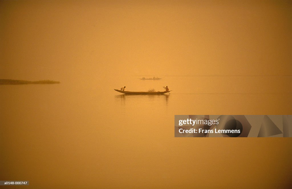 People in Fishing Boat