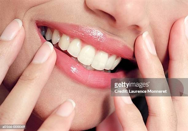 beautiful woman's smile - finger on lips bildbanksfoton och bilder