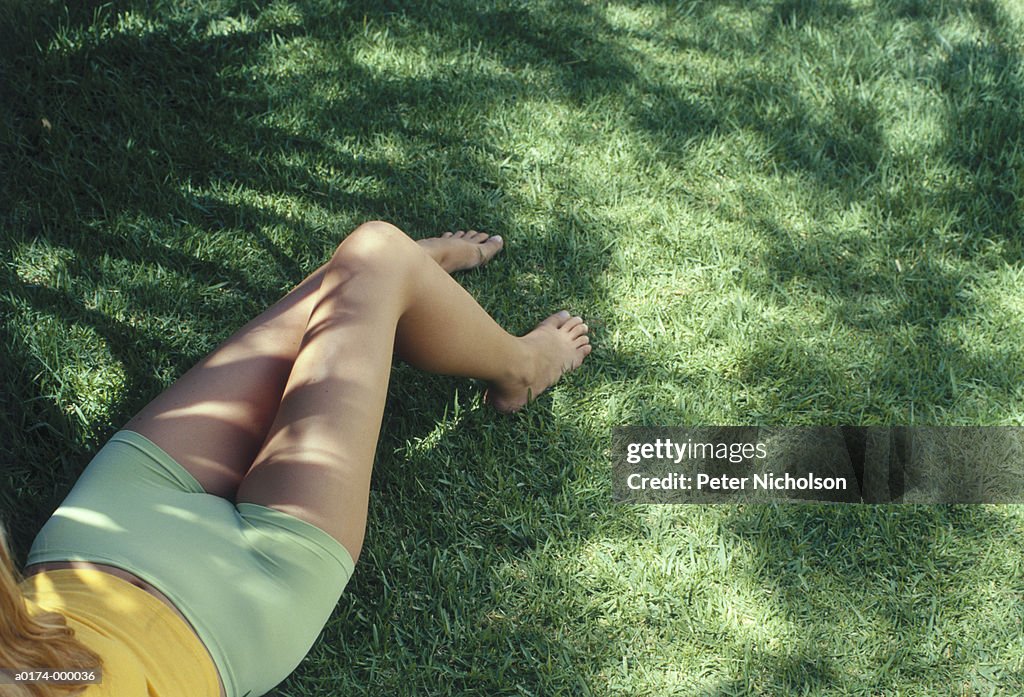 Woman Lying on Grass