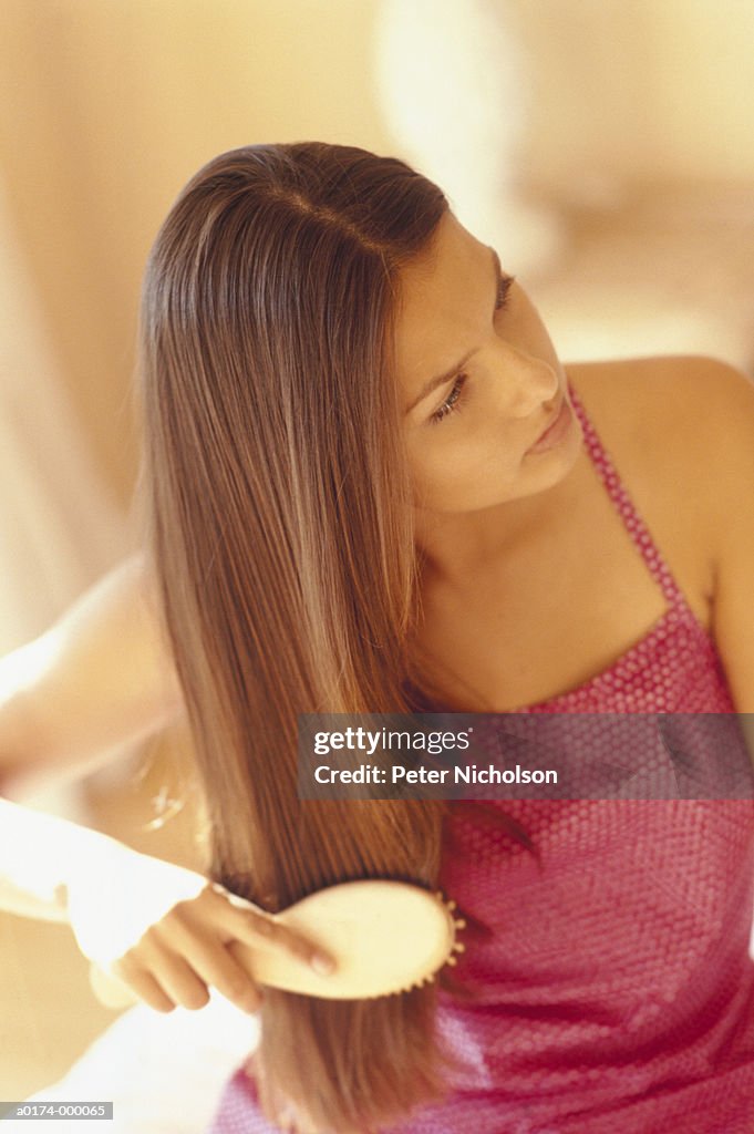 Woman Brushing Hair