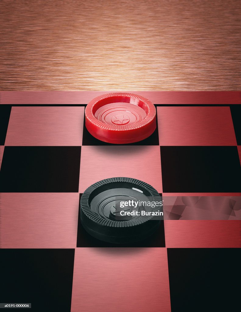 Two Checkers in Stalemate