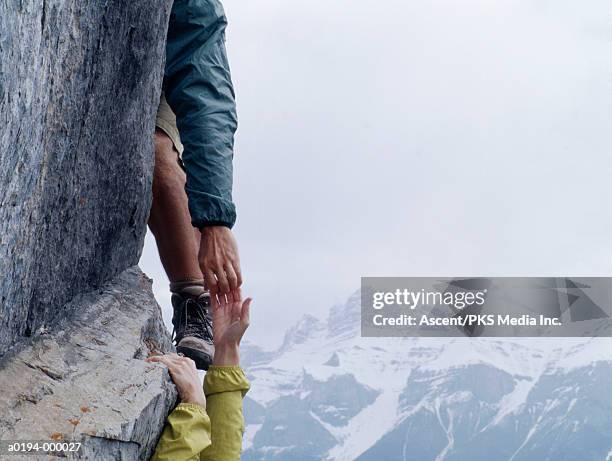 rock climbers - rock climber stockfoto's en -beelden