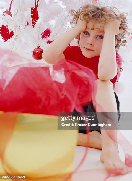 boy opening christmas present - its a boy stock pictures, royalty-free photos & images
