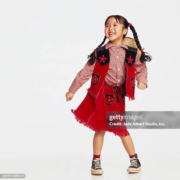girl in cowgirl costume - dancing white background stock pictures, royalty-free photos & images