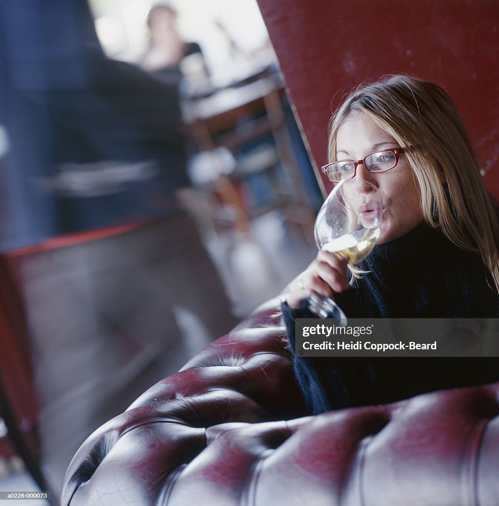 Woman Drinking Glass of Wine