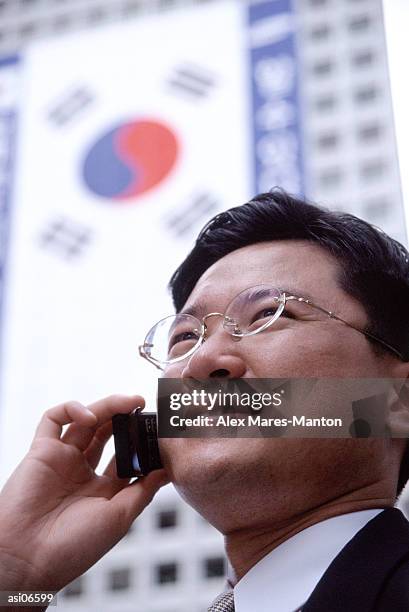 man using mobile phone, head shot - seoul province stockfoto's en -beelden
