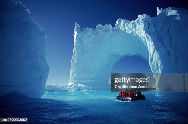 boating by icebergs, yalour islands, antarctica - antarctica boat stock pictures, royalty-free photos & images