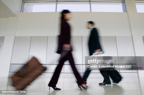 240 2 People Walking Past Each Other Stock Photos, High-Res Pictures ...