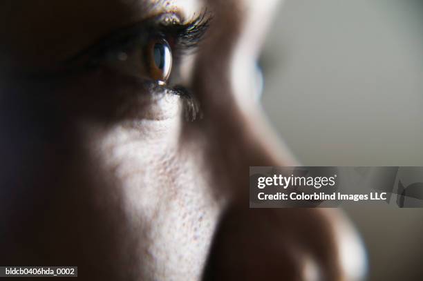 close-up of a person's face - close up eye side stock pictures, royalty-free photos & images