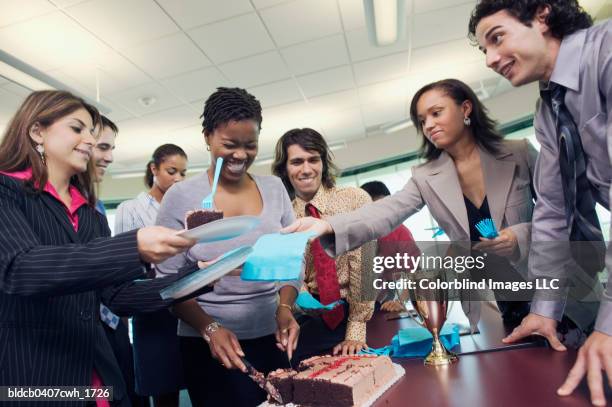 low angle view of business executives in an office party - work party stock pictures, royalty-free photos & images