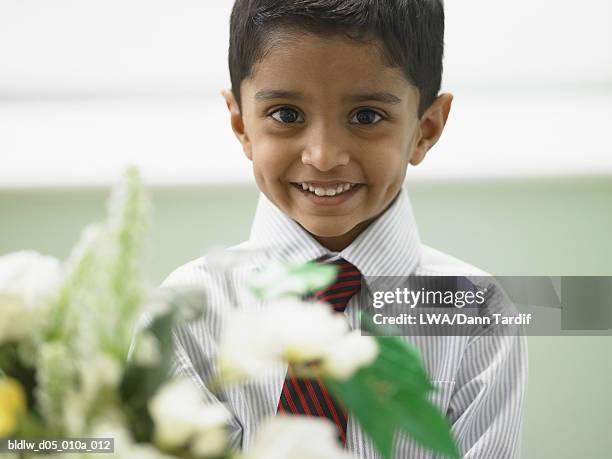 portrait of a boy smiling - lwa dann tardif stockfoto's en -beelden