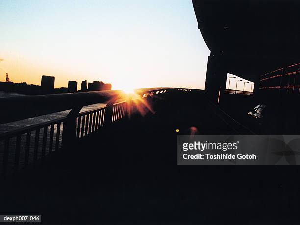 rainbow bridge at sunset,  tokyo bay,  tokyo,  japan - bay bridge fotografías e imágenes de stock