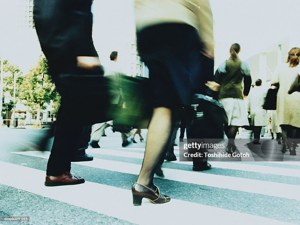 People crossing city street, Shibuya, Tokyo, Japan (blurred motion)