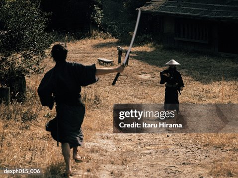 Samurai warrior attacks with a sword Samurai warrior attacks with a sword