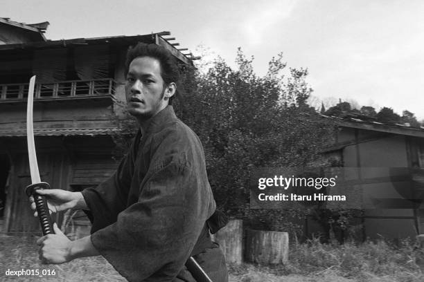samurai warrior strikes an attack - fast furious stock pictures, royalty-free photos & images