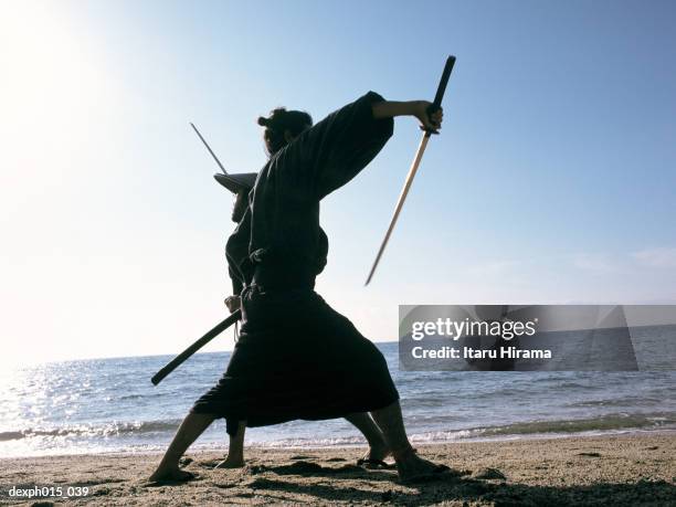 samurai warriors attacking each other - fast furious stock pictures, royalty-free photos & images