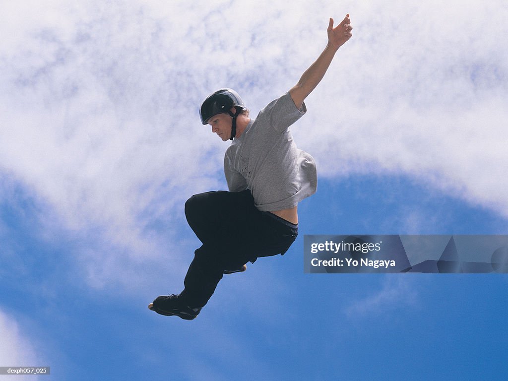 In-line skater in mid-jump
