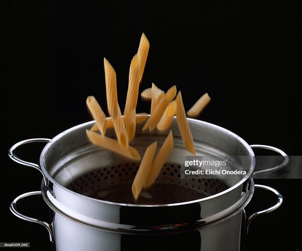 Mostaccioli falling into pot