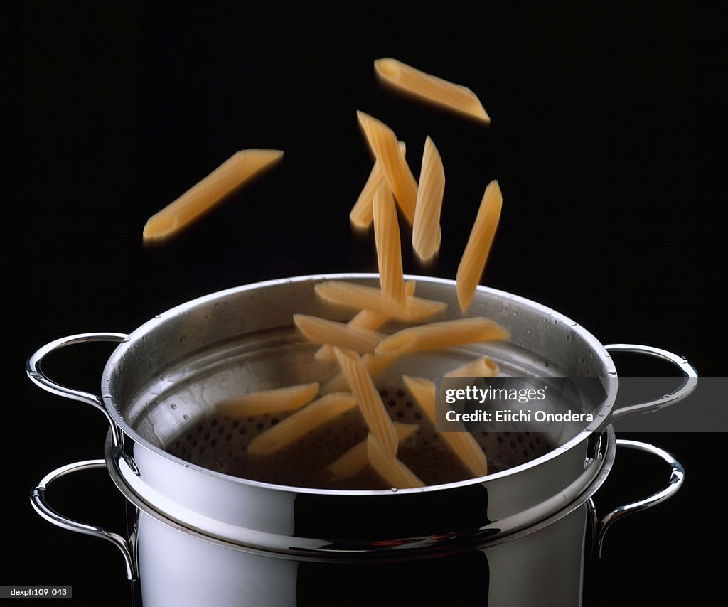 Mostaccioli falling into pot