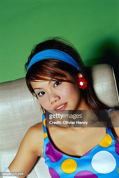 young woman in polka dot blouse, close-up - dot photos et images de collection