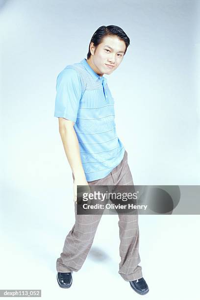 man in polka stripes shirt, posing - henry stockfoto's en -beelden