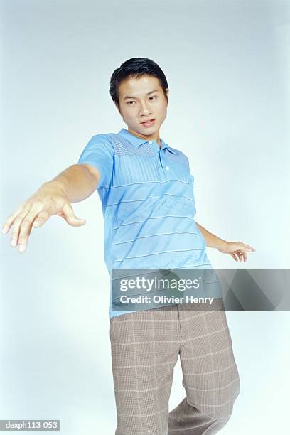 man in polka stripes shirt, posing - henry stock pictures, royalty-free photos & images