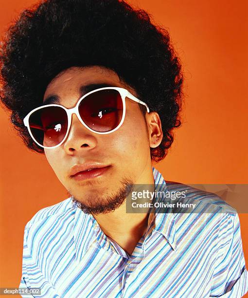 man with afro hair, wearing sunglasses, portrait - henry stock pictures, royalty-free photos & images