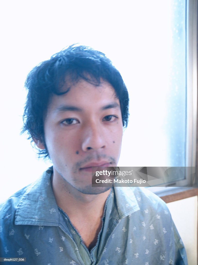 Portrait of a young Asian man