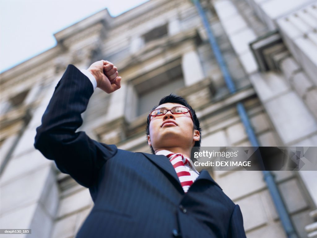 Young man standing on a ledge