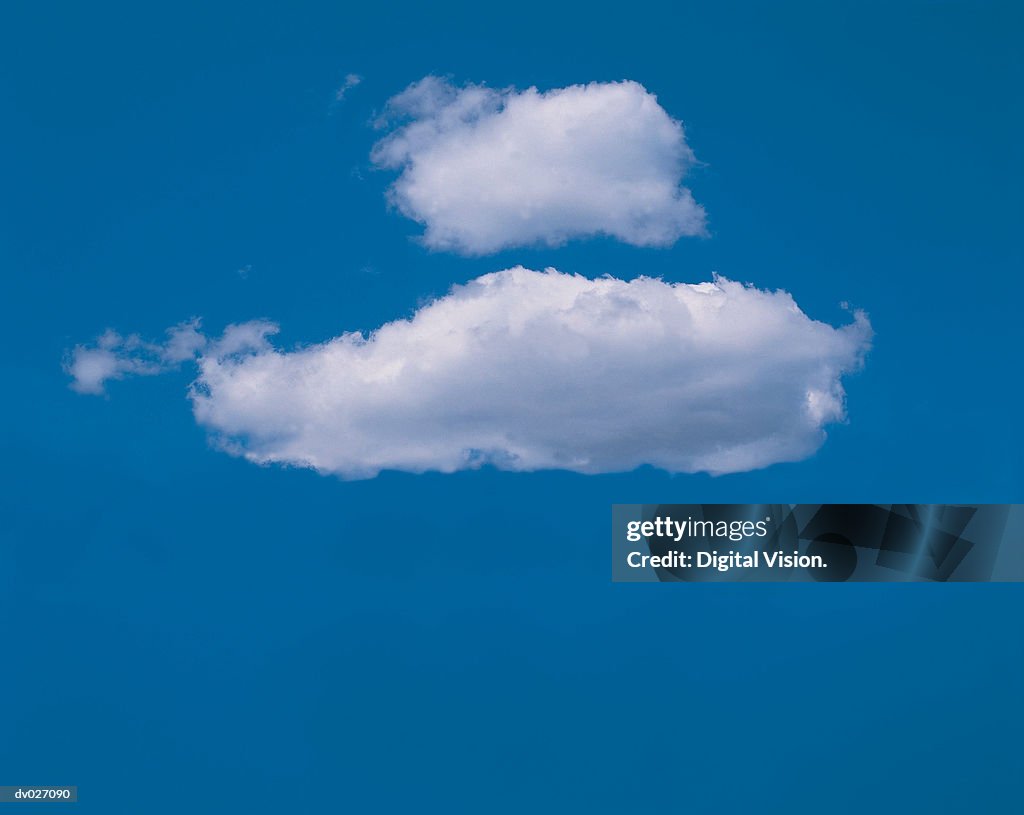Two cumulus clouds