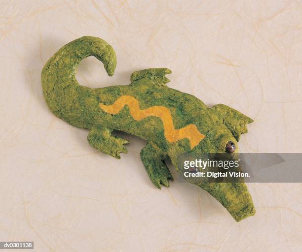alligator, papier-mache - animal representation stock pictures, royalty-free photos & images
