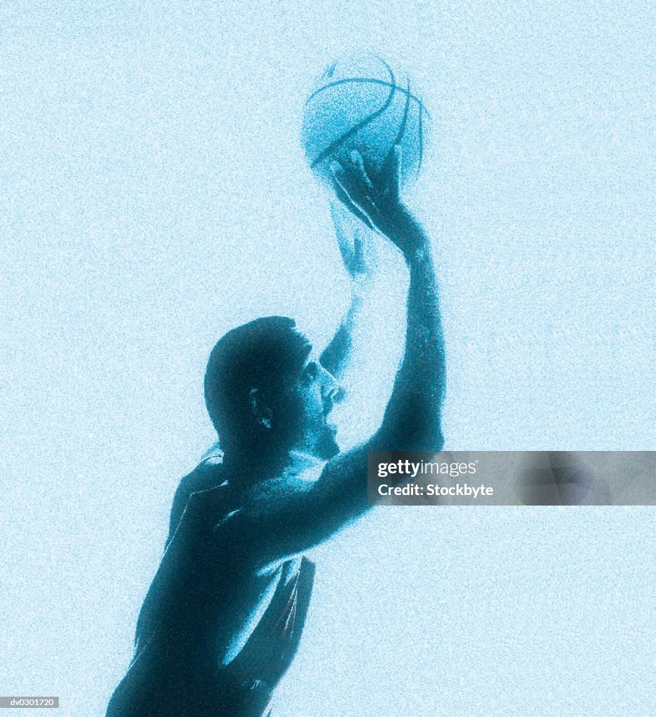 Basketball Player Shooting Ball High-Res Stock Photo - Getty Images