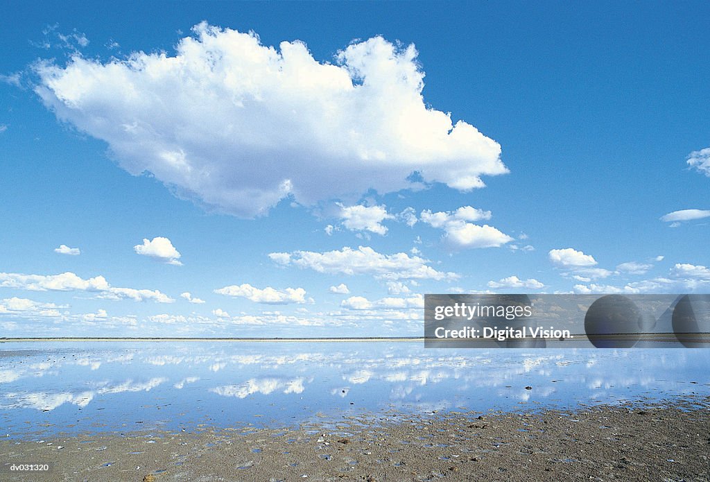 Salt Pan and clouds, Botswana