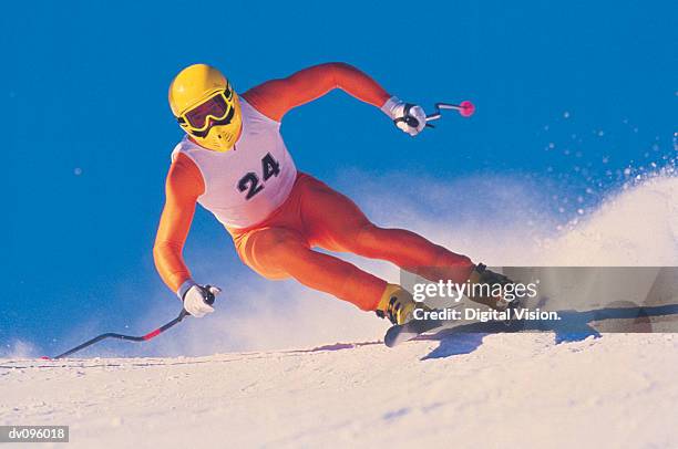 downhill skier - alpine skiing stock pictures, royalty-free photos & images