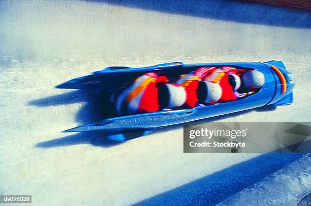 bobsled racing - bobsleigh team stock pictures, royalty-free photos & images