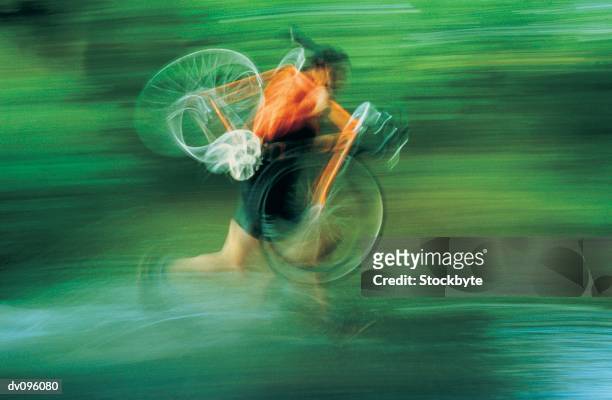 cyclist with bike on shoulder, running - panorering bildbanksfoton och bilder