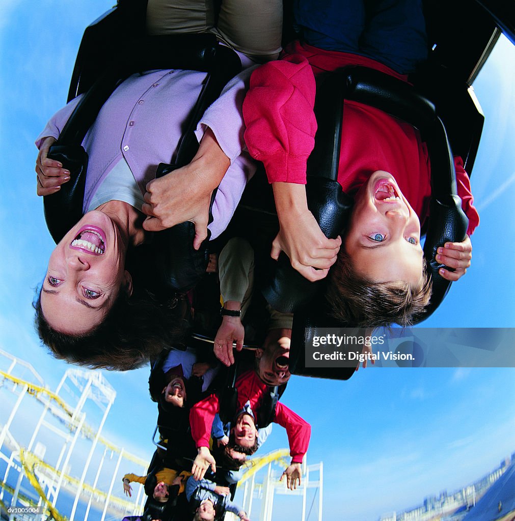 Mother and Son upside Down on a Roller Coaster