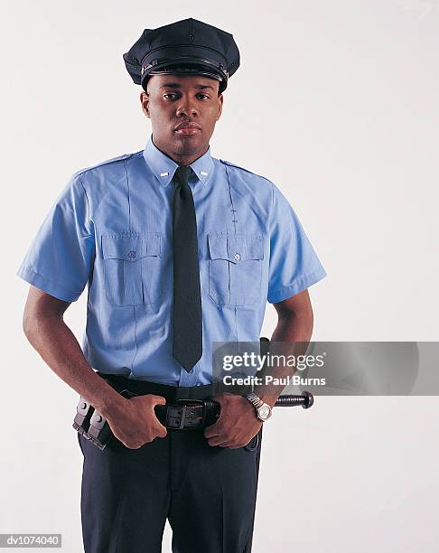 portrait of a policeman - emergency services equipment stock pictures, royalty-free photos & images