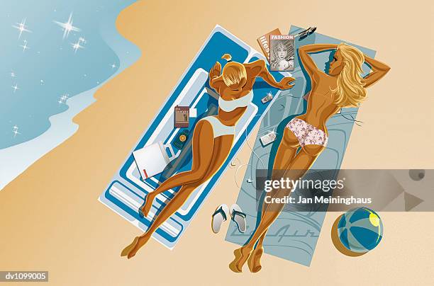 two young women lying on towels on a beach - looking down at camera stock illustrations