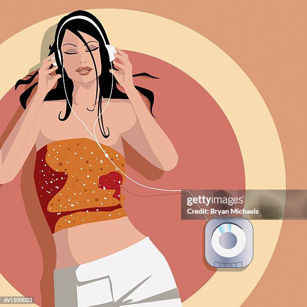 bildbanksillustrationer, clip art samt tecknat material och ikoner med overhead view of a young woman listening to her personal stereo lying down - personal stereo