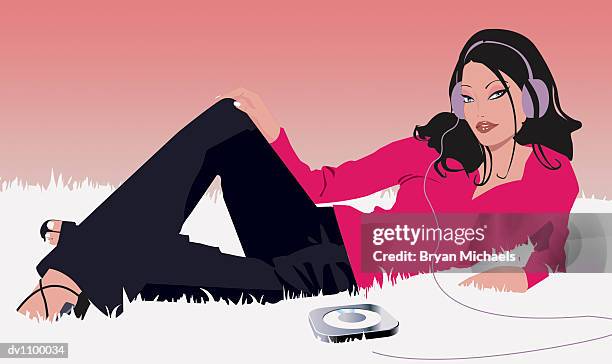 stockillustraties, clipart, cartoons en iconen met portrait of a young woman lying on a rug listening to her personal stereo through headphones - michaels