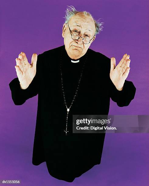 portrait of a balding priest in a habit - priest collar stock pictures, royalty-free photos & images