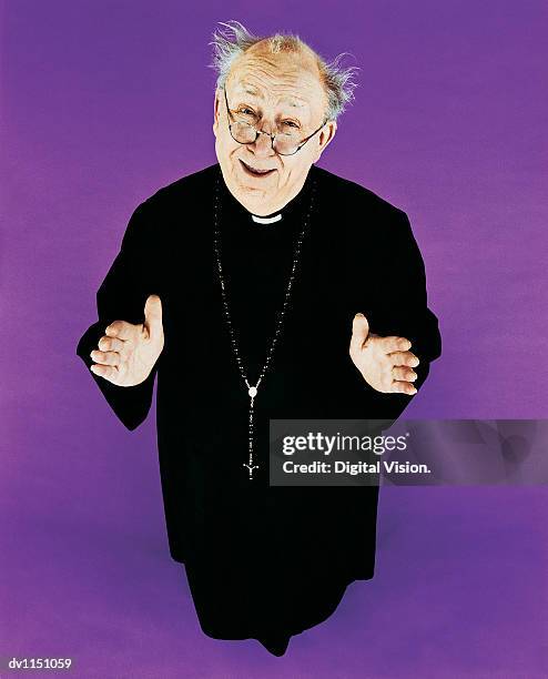 portrait of a balding priest in a habit - priest collar stock pictures, royalty-free photos & images